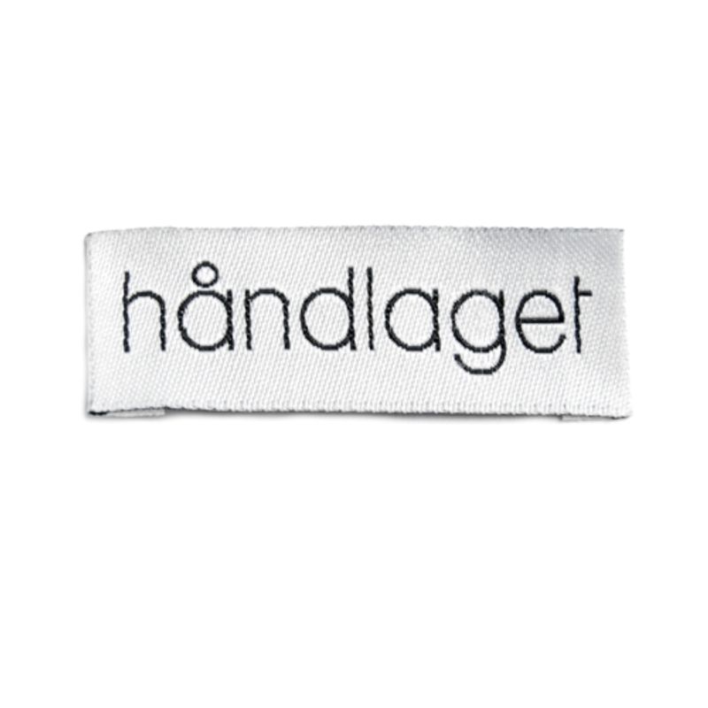 Symerke Håndlaget hvit/svart